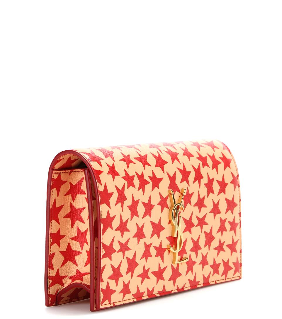 monogram quilted leather clutch