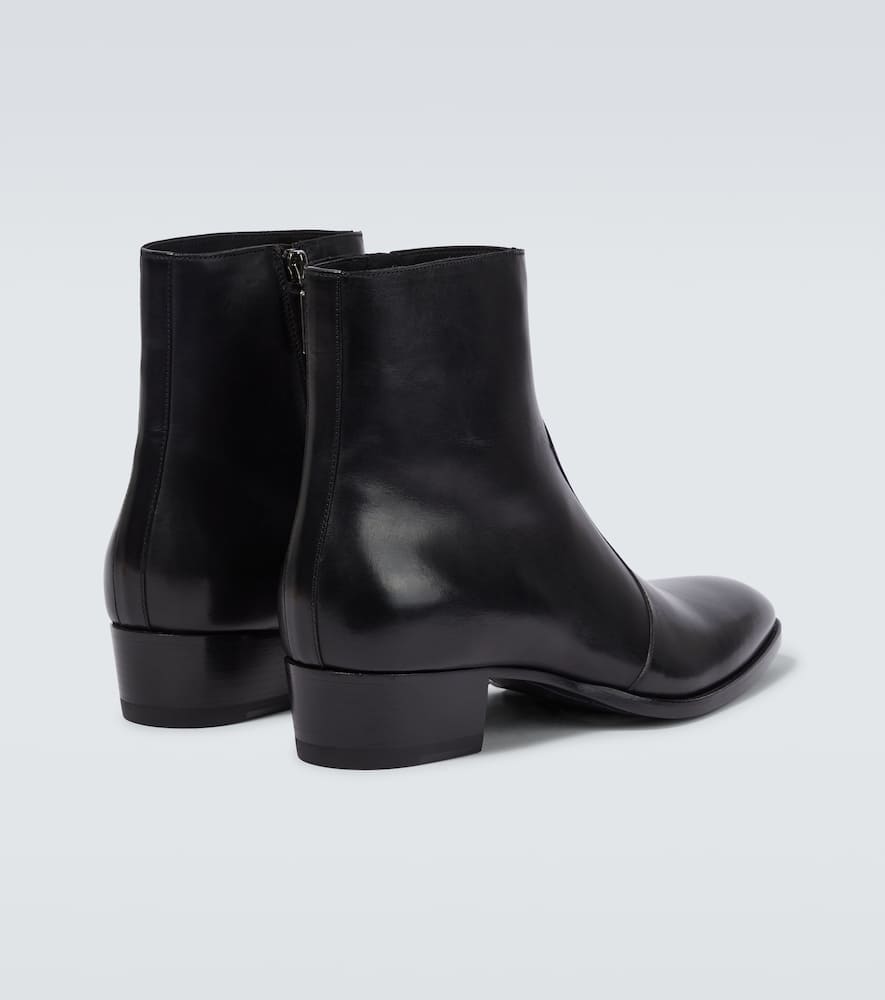 Shop Saint Laurent Wyatt Leather Ankle Boots In Nero