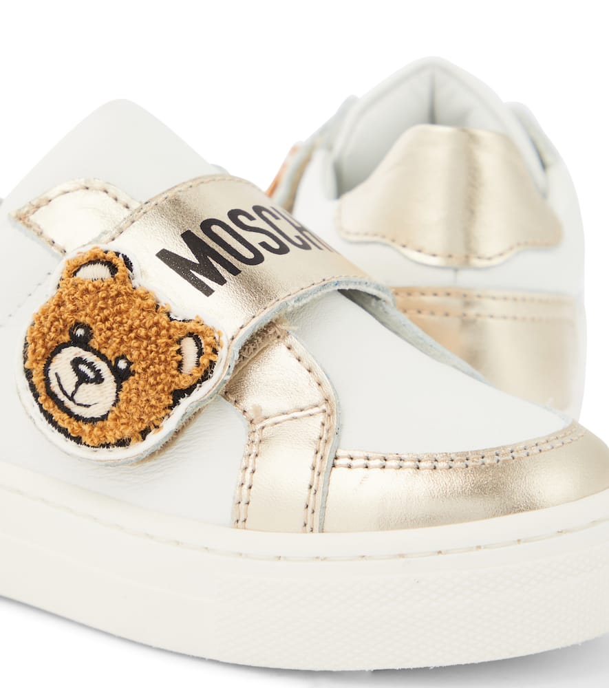 Shop Moschino Teddy Bear Leather Sneakers In Gold