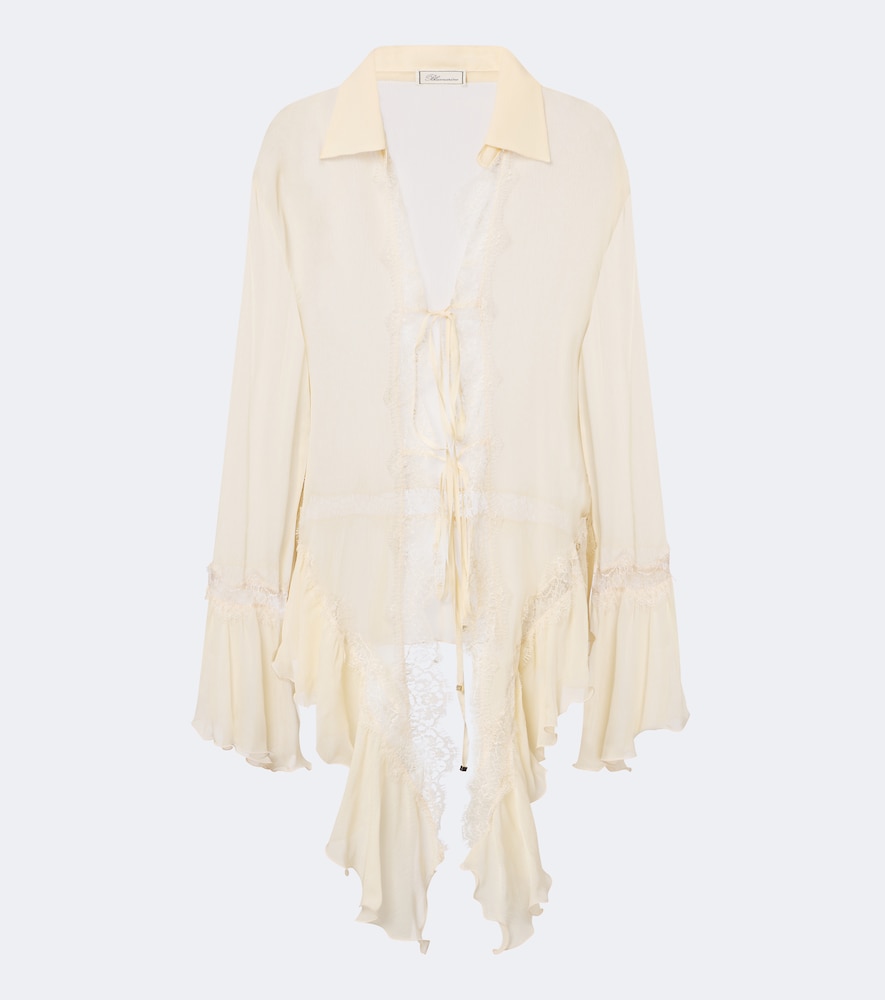 Blusa asimmetrica con pizzo