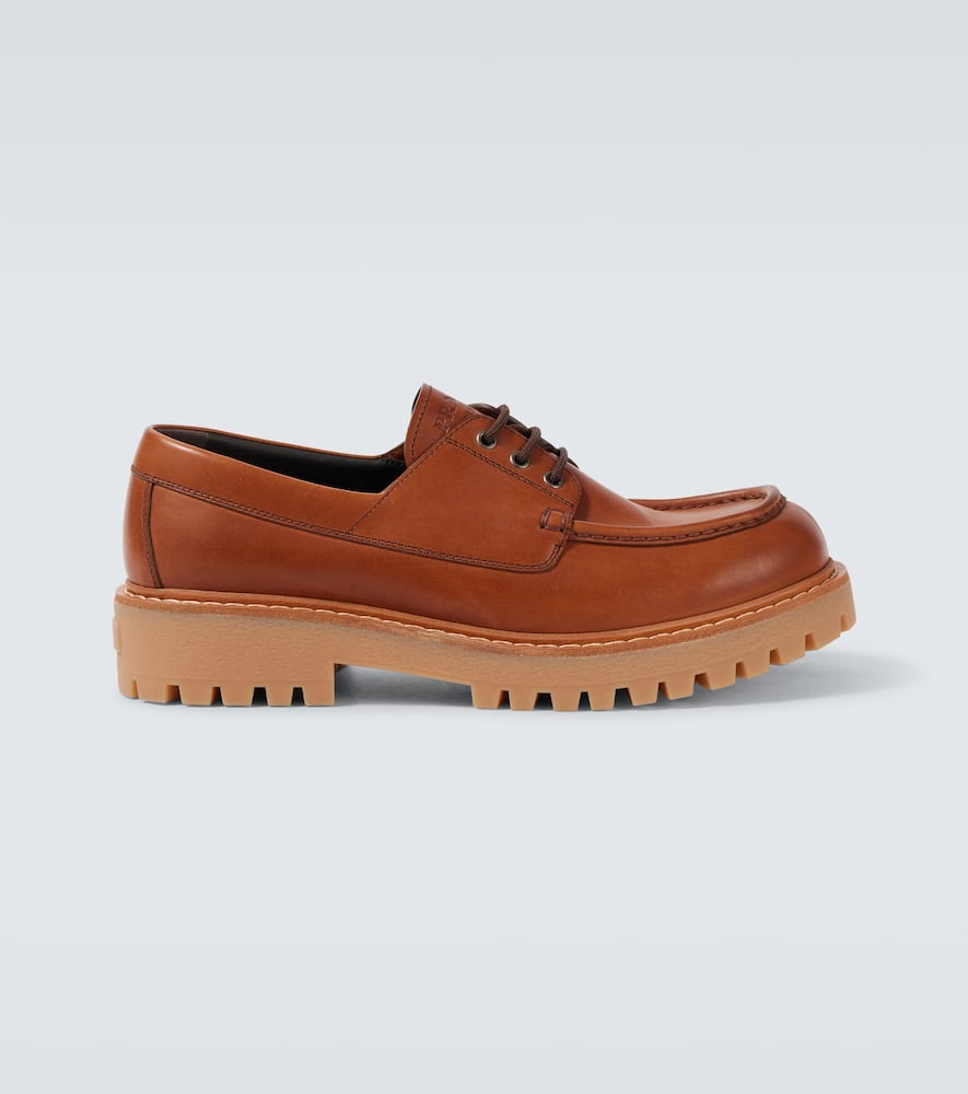 Prada Leather Loafers With Embossed-logo In Brown