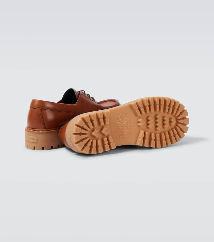 Prada Leather Loafers With Embossed-logo In Brown