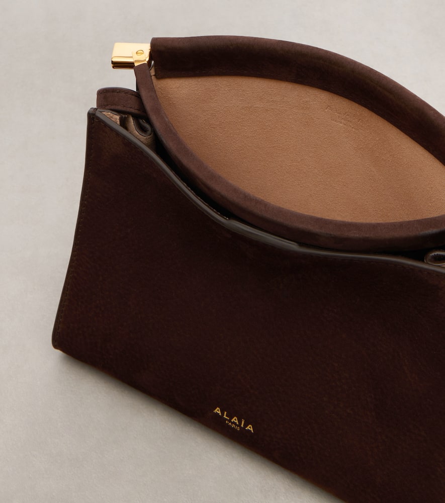 Alaïa Le Click Small Suede Shoulder Bag In Brown