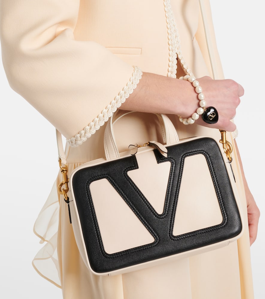 Valentino Garavani Viva Superstar Small Leather Duffle Bag In White