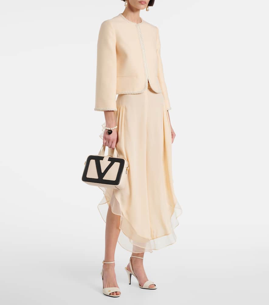 Valentino Garavani Viva Superstar Small Leather Duffle Bag In White
