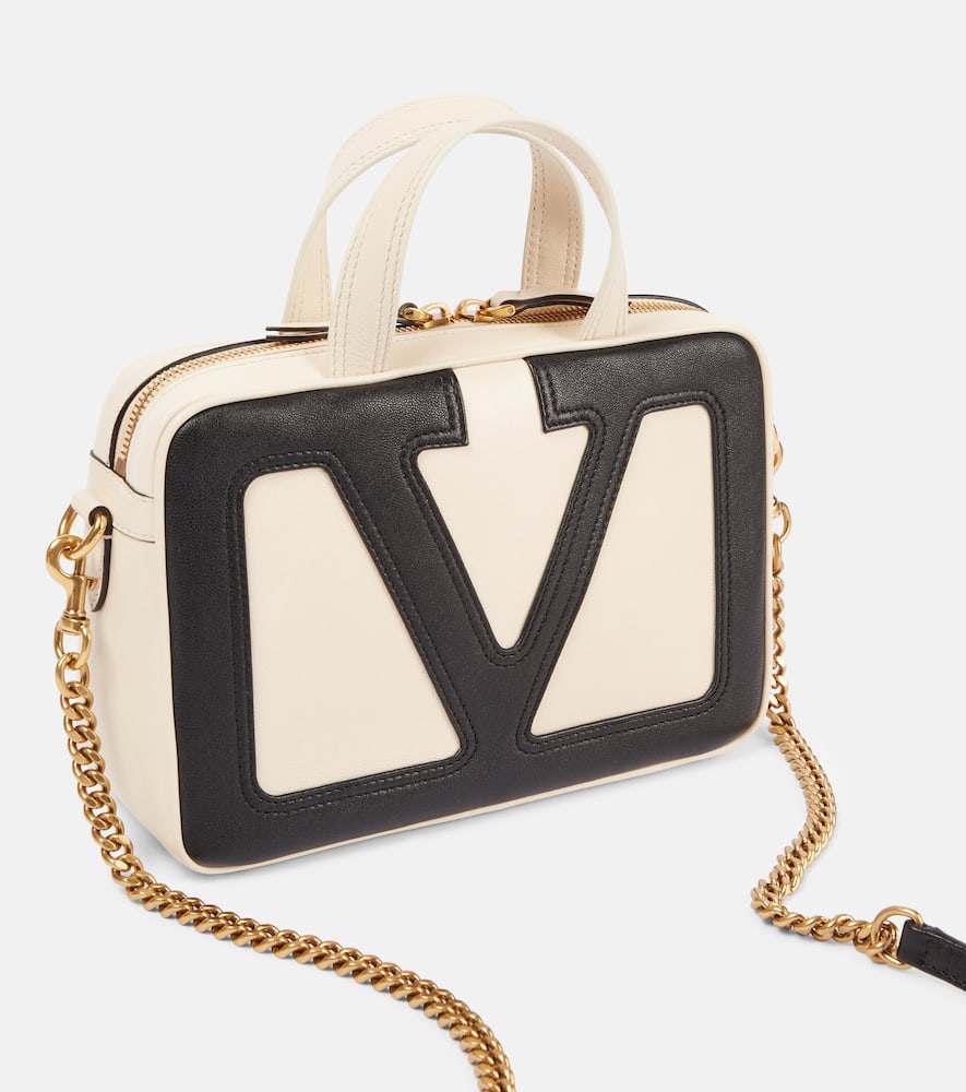 Valentino Garavani Viva Superstar Small Leather Duffle Bag In White