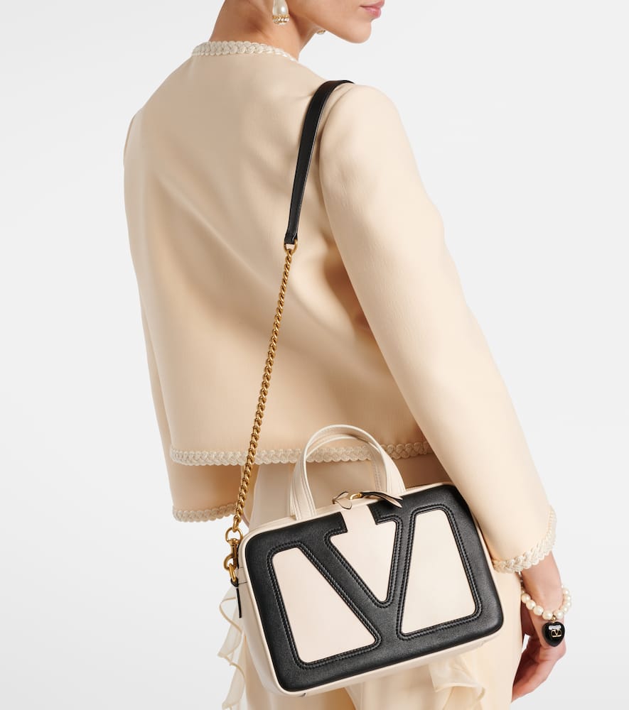 Valentino Garavani Viva Superstar Small Leather Duffle Bag In White