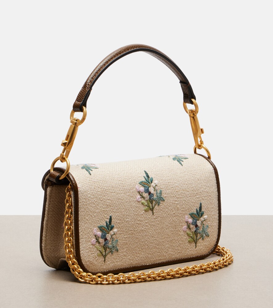  Valentino Garavani Valentino Garavani Bestickte Henkeltasche Locò Small Aus Leinen 