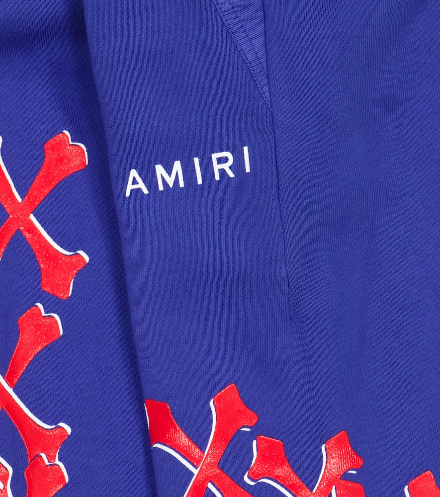 Shop Amiri Printed Cotton Sweatpants In Blue