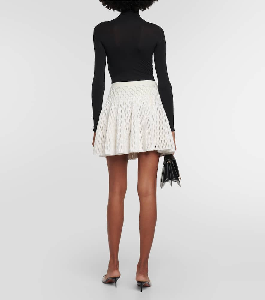 Shop Alaïa High-rise Knit Miniskirt In Neutrals