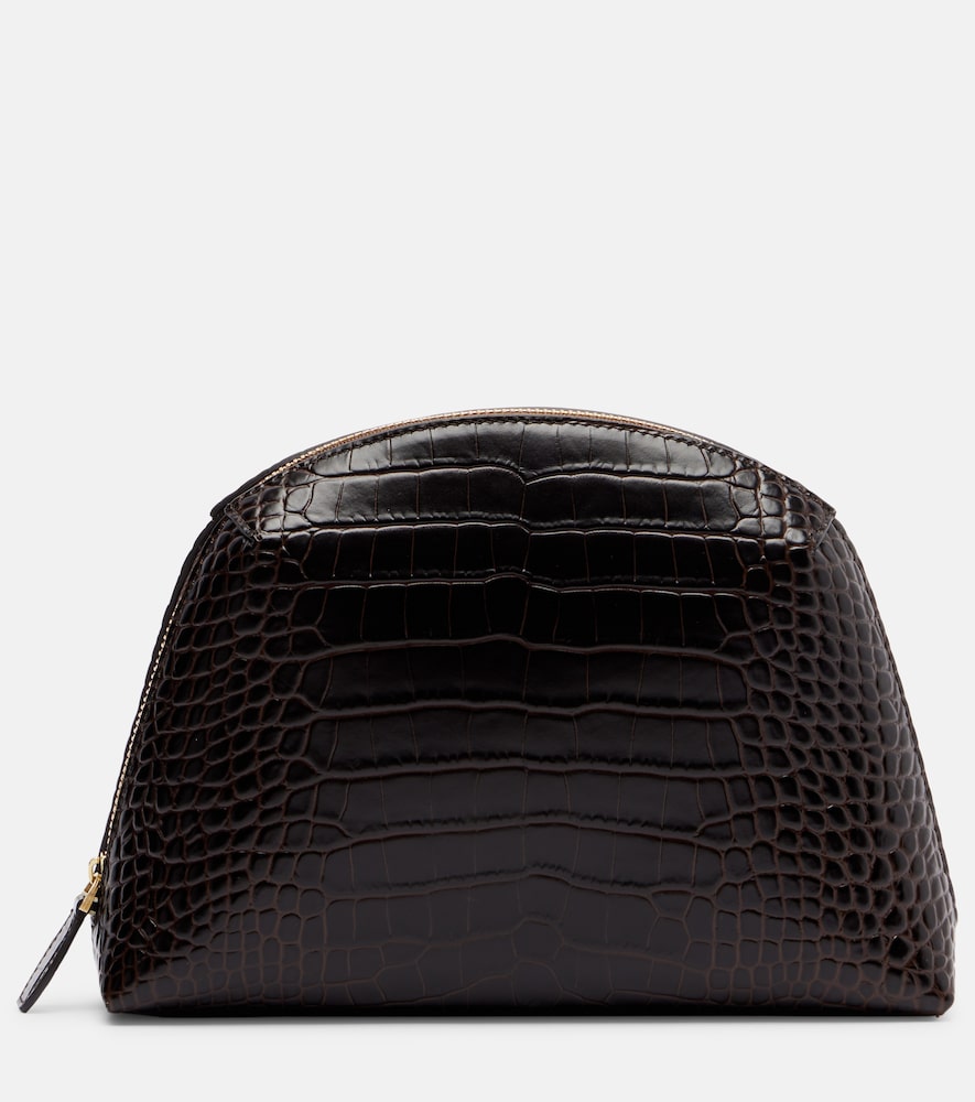 Toteme Pochette Small en cuir emboss 440 €