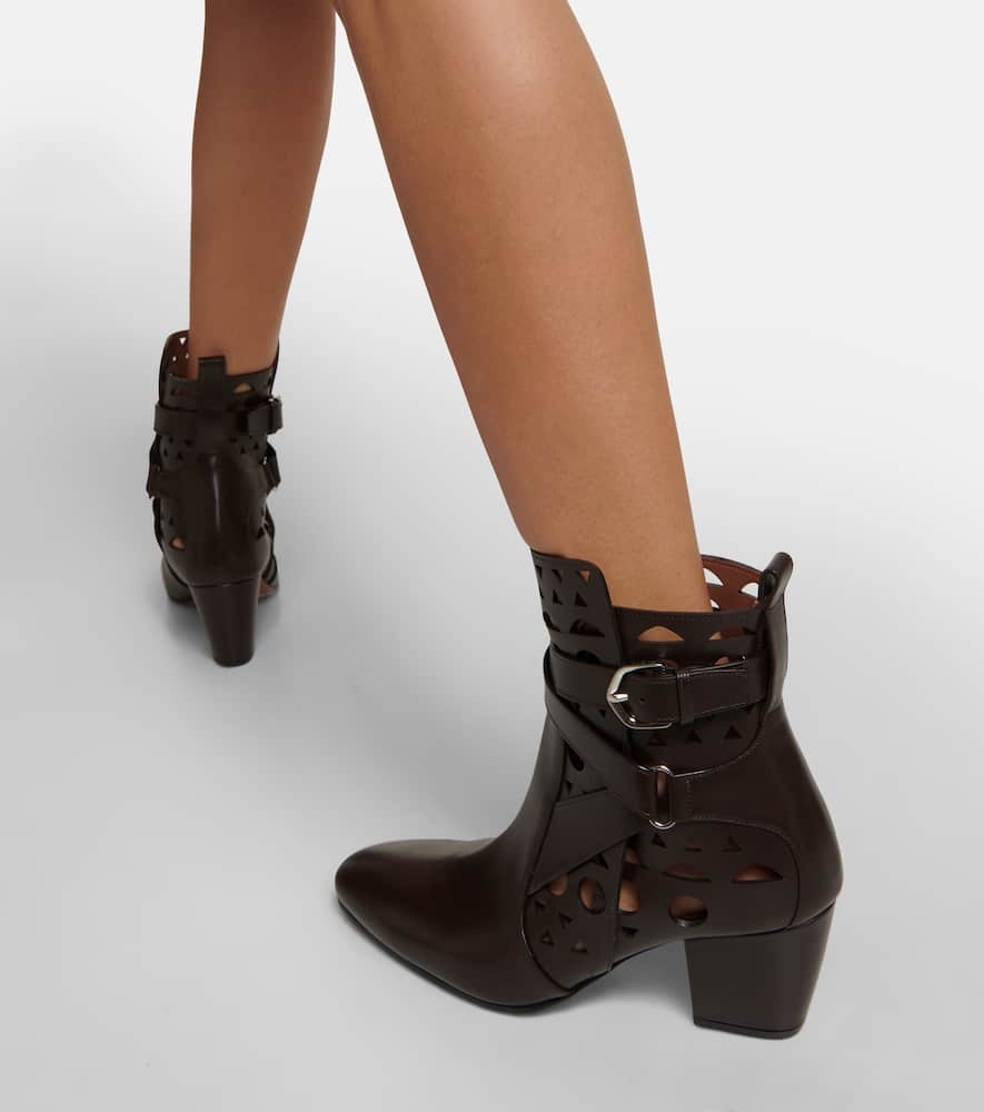 Shop Alaïa Ziggy Vienne Leather Ankle Boots In Black