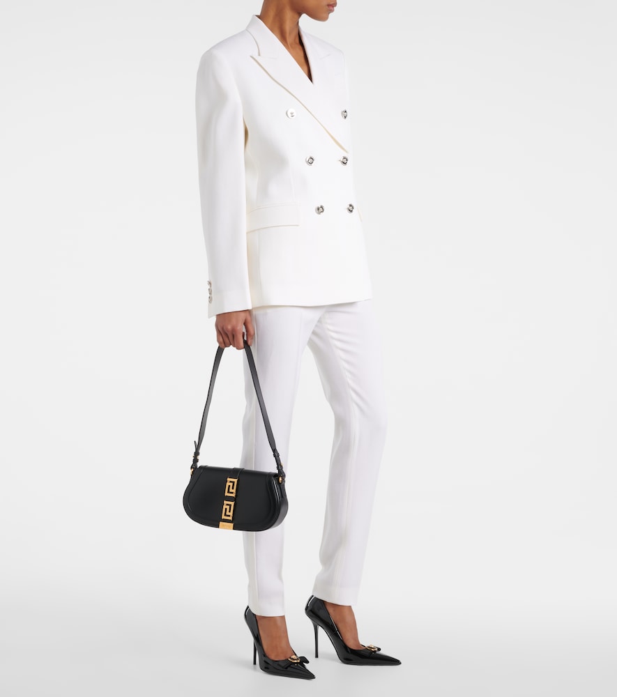 Versace High-rise wool slim pants