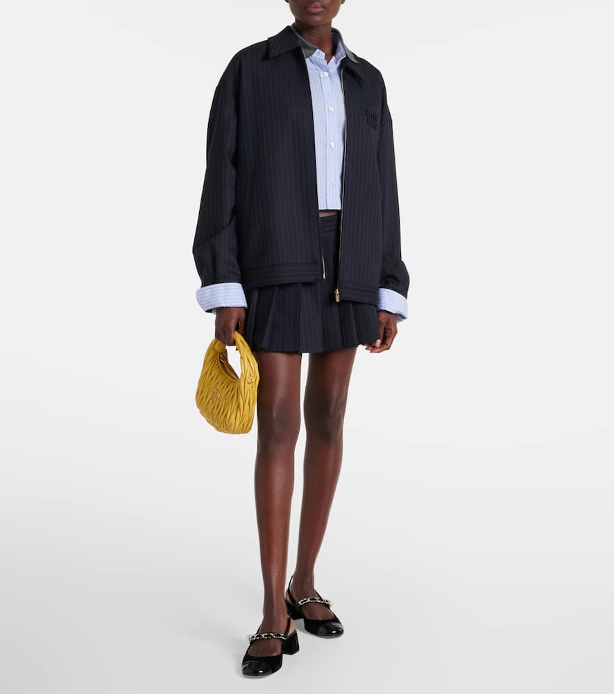 Miu Miu Black Canvas And Leather Pumps In Black