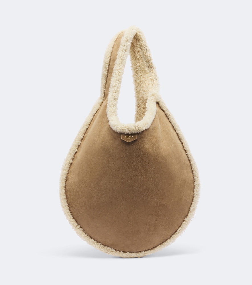 Alaïa One Piece Shearling-Lined Shoulder Bag