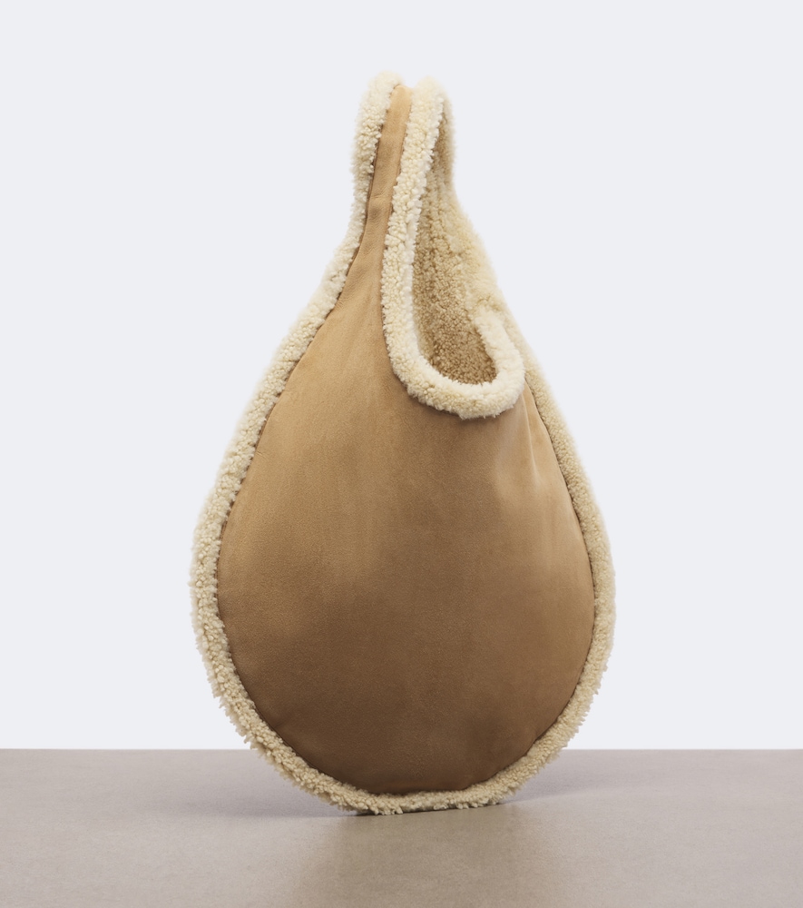 Alaïa One Piece Shearling-Lined Shoulder Bag