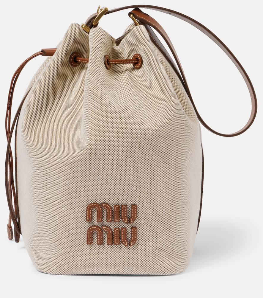 Miu Miu Logo Leather-trimmed Bucket Bag In Beige