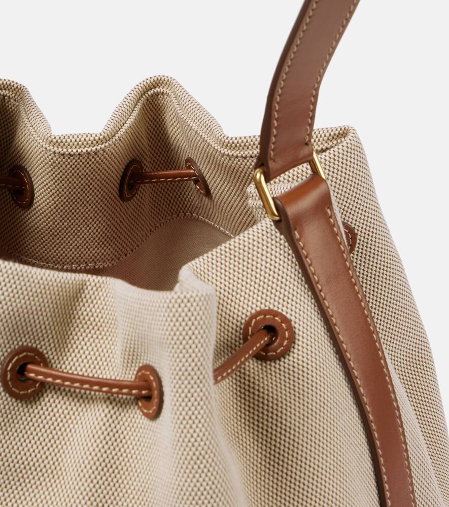 Miu Miu Logo Leather-trimmed Bucket Bag In Beige