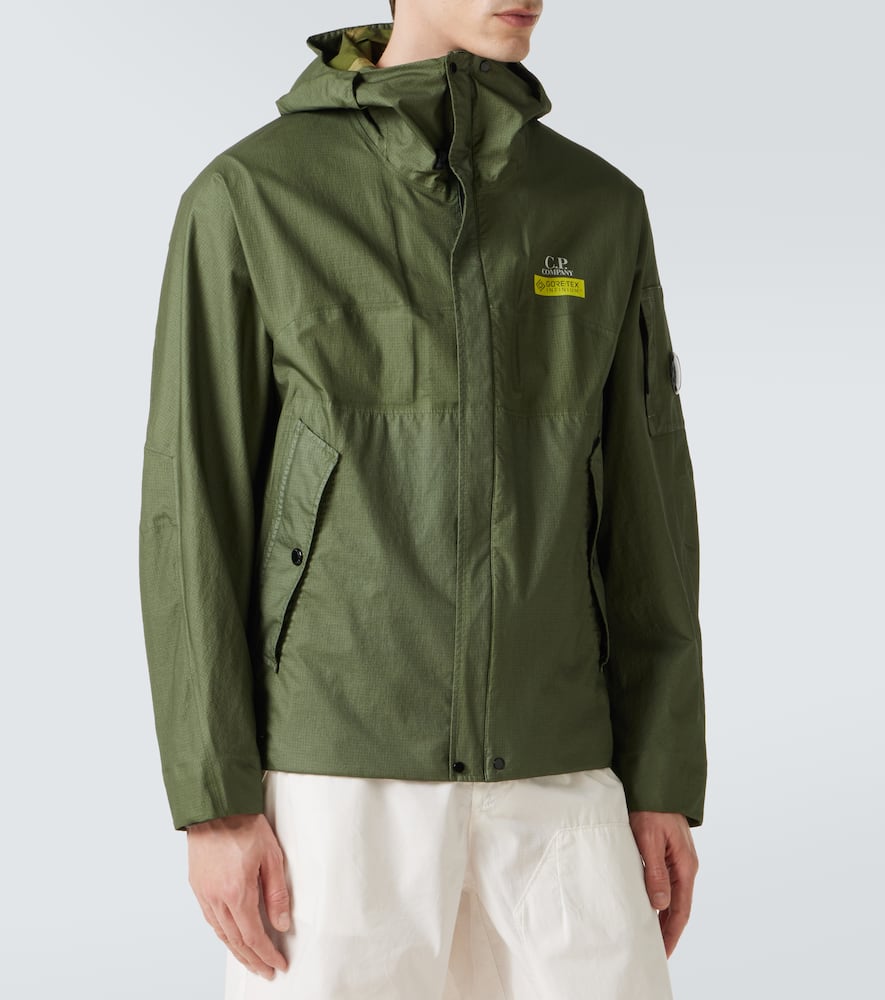 C.p. Company Logo-print Reversible Down Jacket In Grün