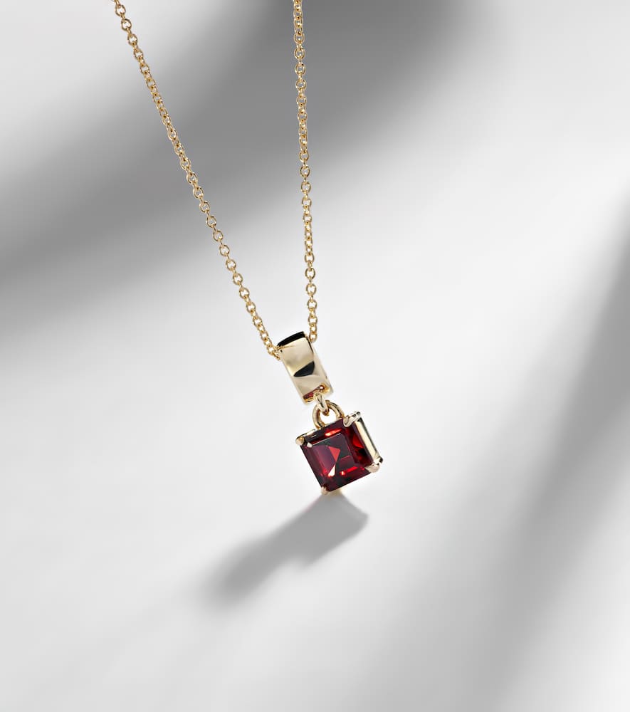 Stone And Strand 10kt Gold Charm Necklace With Garnet In Gold
