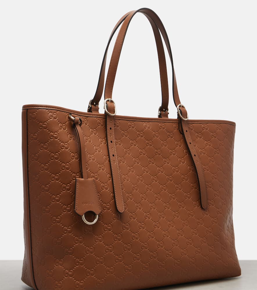 Gucci Emblem Gg Leather Tote Bag In Sand