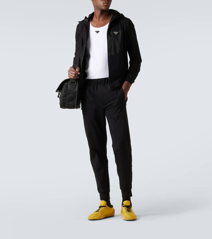 Prada Buttoned Tapered Leg Pants In Black