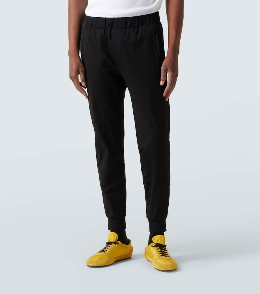 Prada Buttoned Tapered Leg Pants In Black