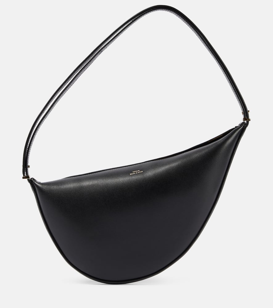 Shop Totême Scooped Leather Shoulder Bag In Black