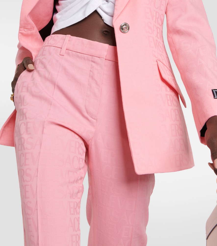 Shop Versace Allover Flared Wool Pants In Pink