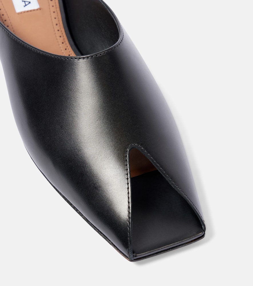 Shop Alaïa Spike Leather Mules In Black