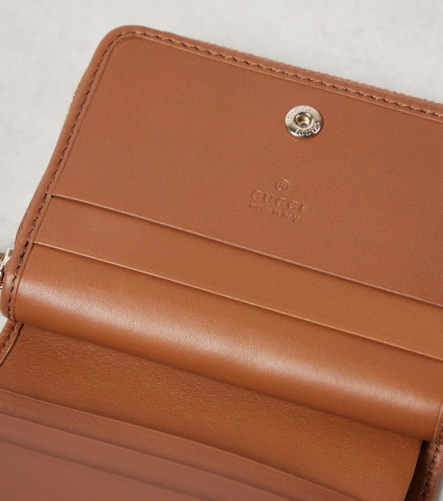 Gucci Gg Canvas Mini Leather-trimmed Wallet In Beige