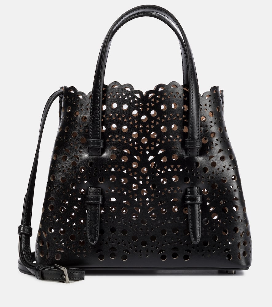 Click to view more detailed imagery on our partner's website Alaïa Mina Mini Cutout Top Handle Bag In Black
