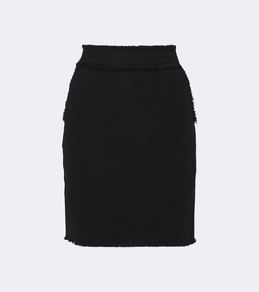 Max Mara Mini-jupe en laine vierge 365 €