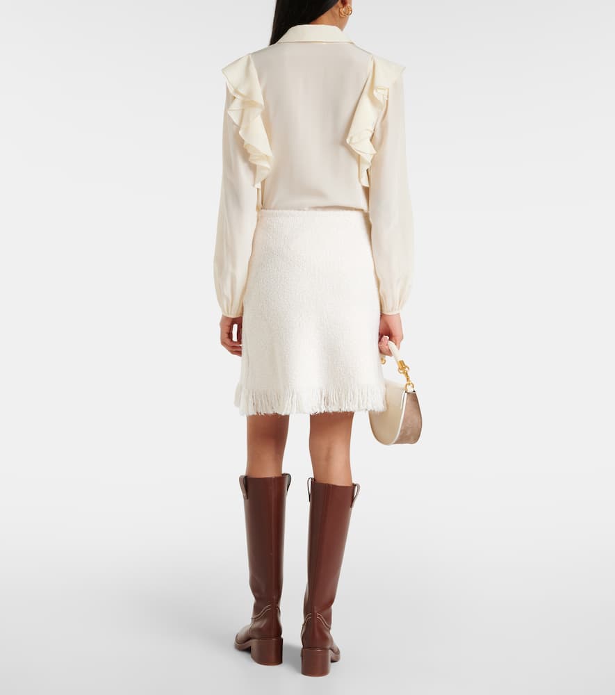 Shop Chloé Fringed Bouclé Miniskirt In White