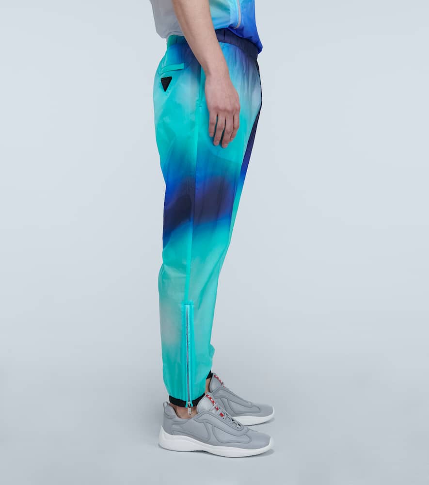 Shop Prada Printed Technical Pants In Blue