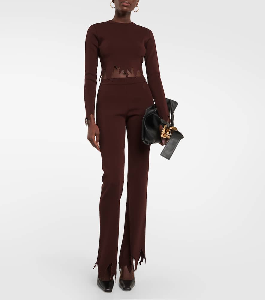 Jw Anderson Ribbed-knit Distressed Slim Pants In Brown