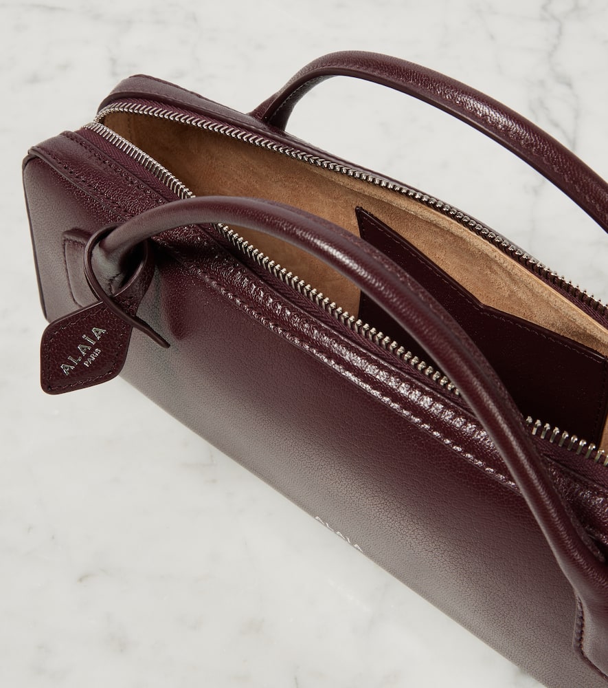 Alaïa Le Teckel Leather Clutch In Burgundy