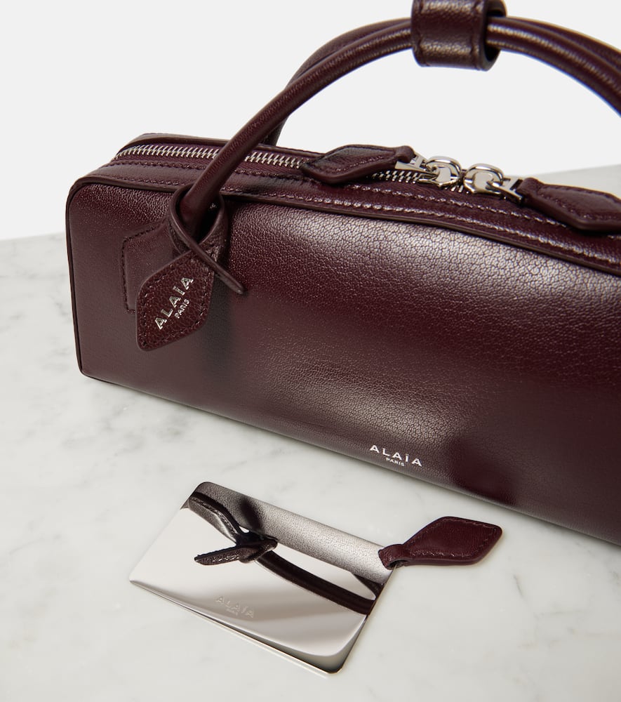 Alaïa Le Teckel Leather Clutch In Burgundy