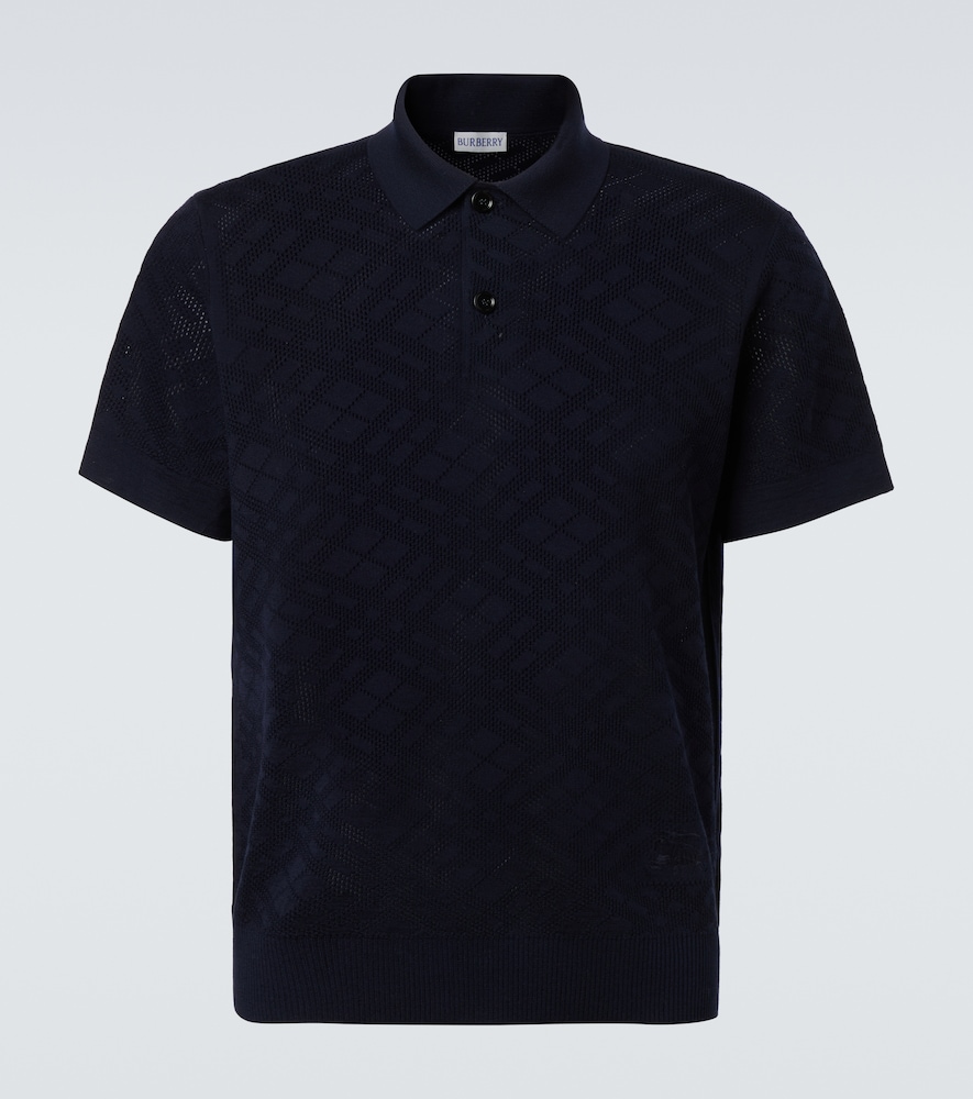Burberry Polo en laine 477 €