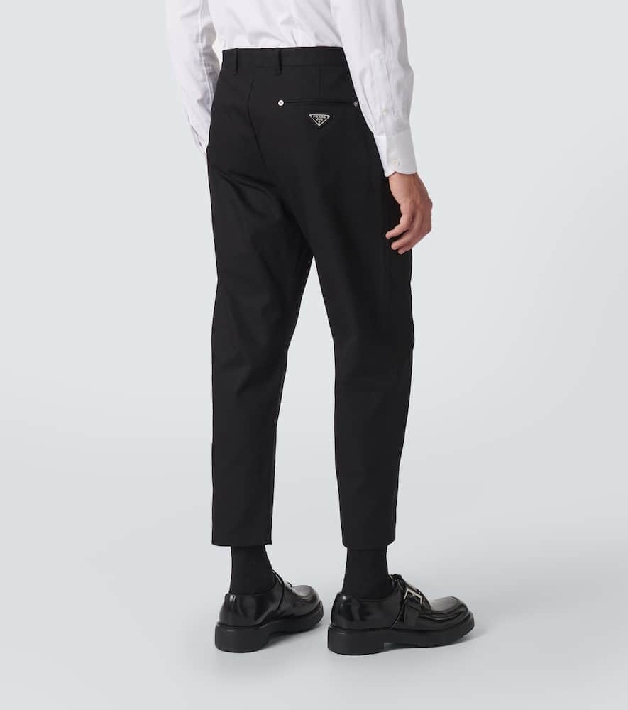 Prada Triangle-logo Tapered-leg Jeans In Black