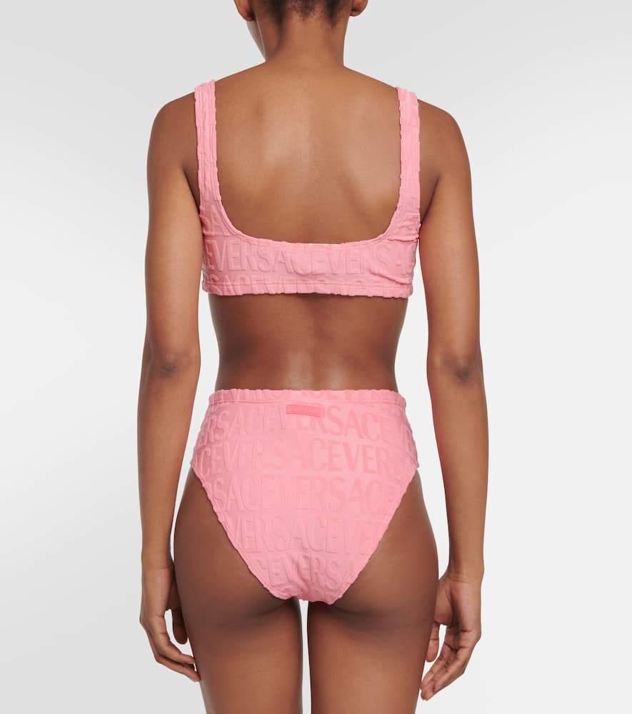 Shop Versace La Greca Jacquard Bikini Bottoms In Pink