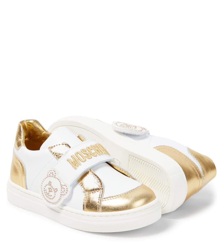 Shop Moschino Leather Sneakers In White