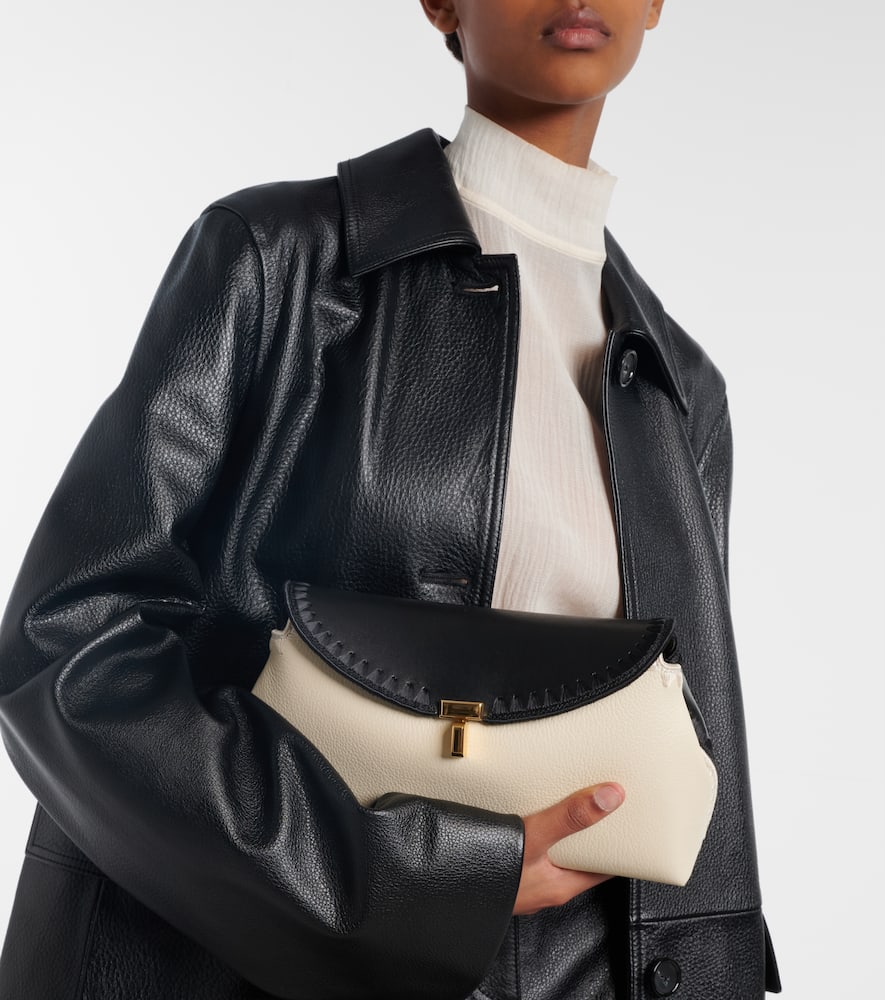 Totême T-lock Leather Clutch In Neutral