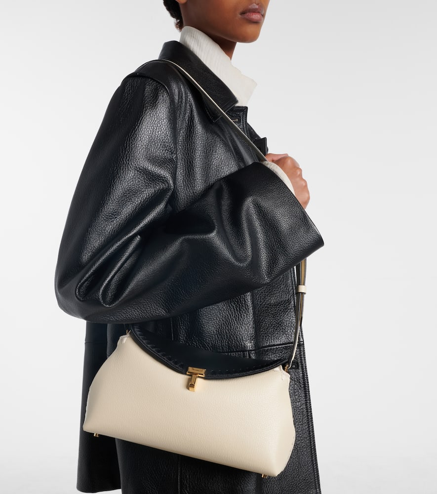Totême T-lock Leather Clutch In Neutral