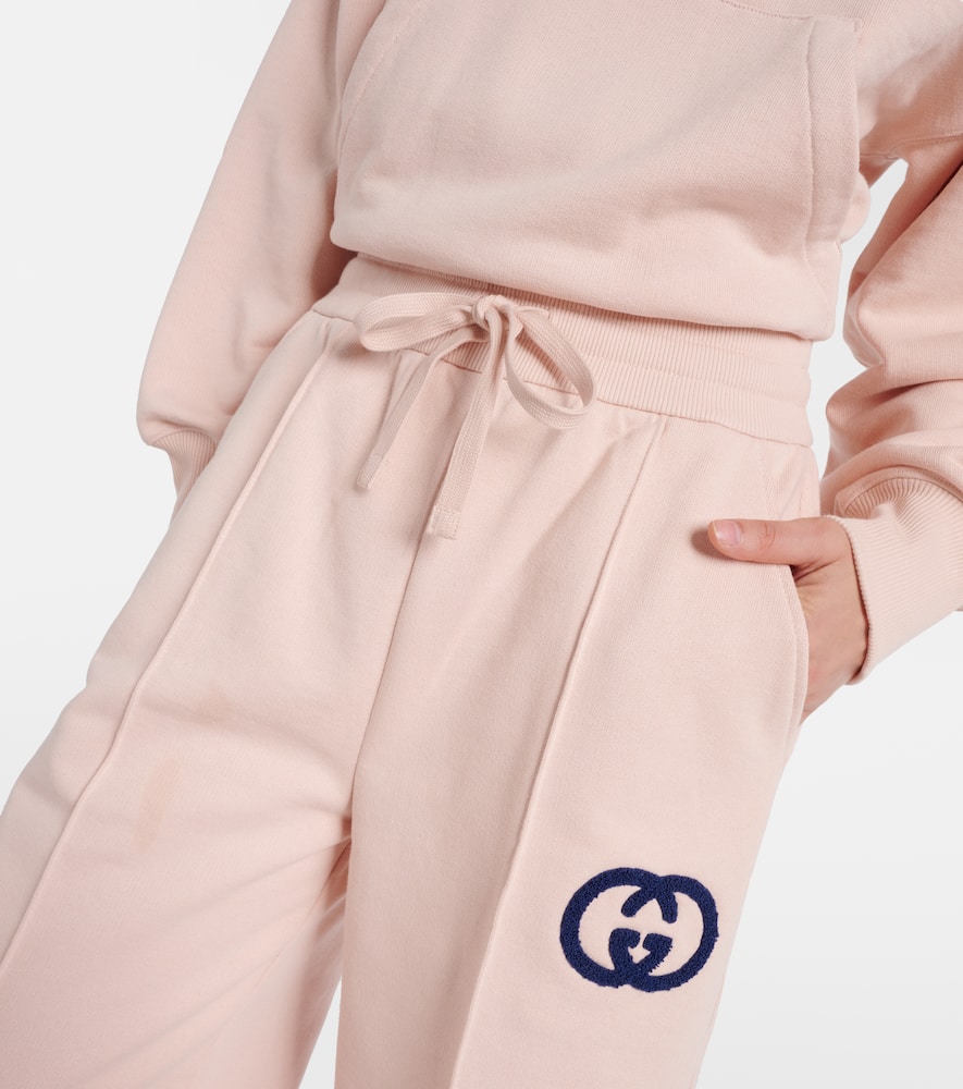 Shop Gucci Gg Embroidered Cotton Jersey Sweatpants In Pink