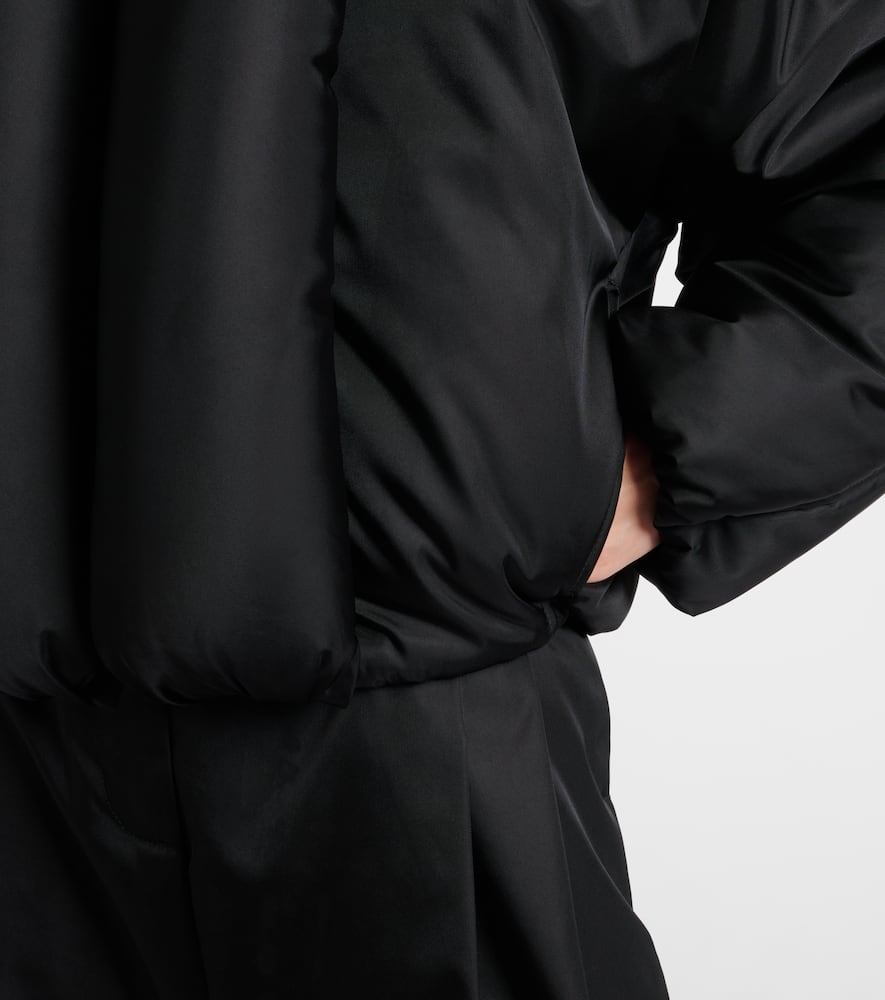 Alaïa Insulated Long Sleeve High Collar Jacket In Black