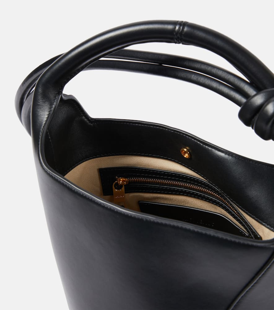 Shop Jacquemus Le Petit Tourni Leather Bucket Bag In Black