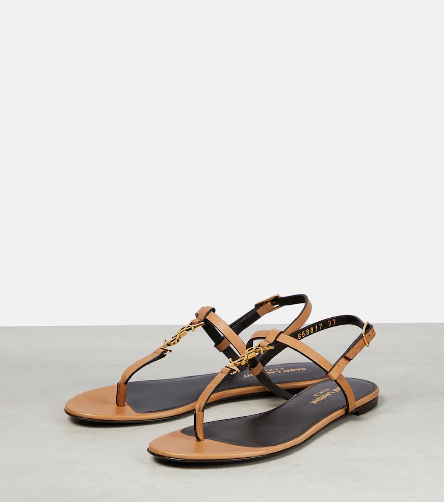 Shop Saint Laurent Cassandra Leather Thong Sandals In Gold Brown