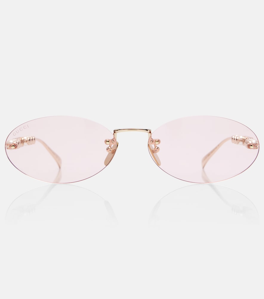 Gucci Logo embellished oval sunglasses
