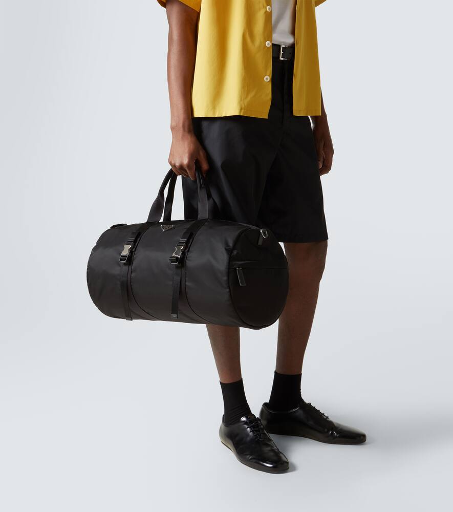 PRADA RE-NYLON LEATHER-TRIMMED DUFFEL BAG